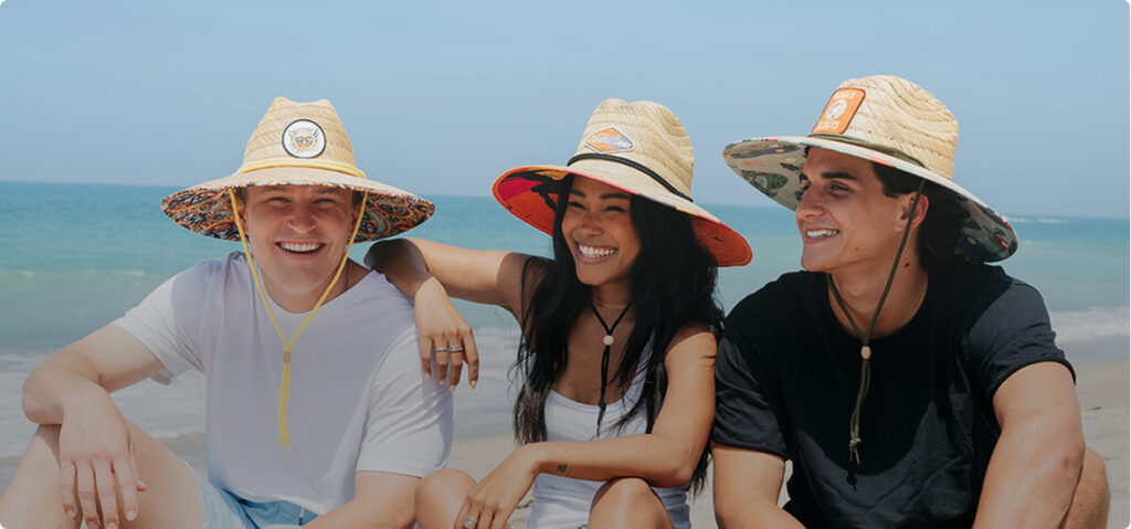 custom straw lifeguard hats with woven patches at beach