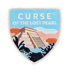 blue shield embroidered patch with tropical pyramid design