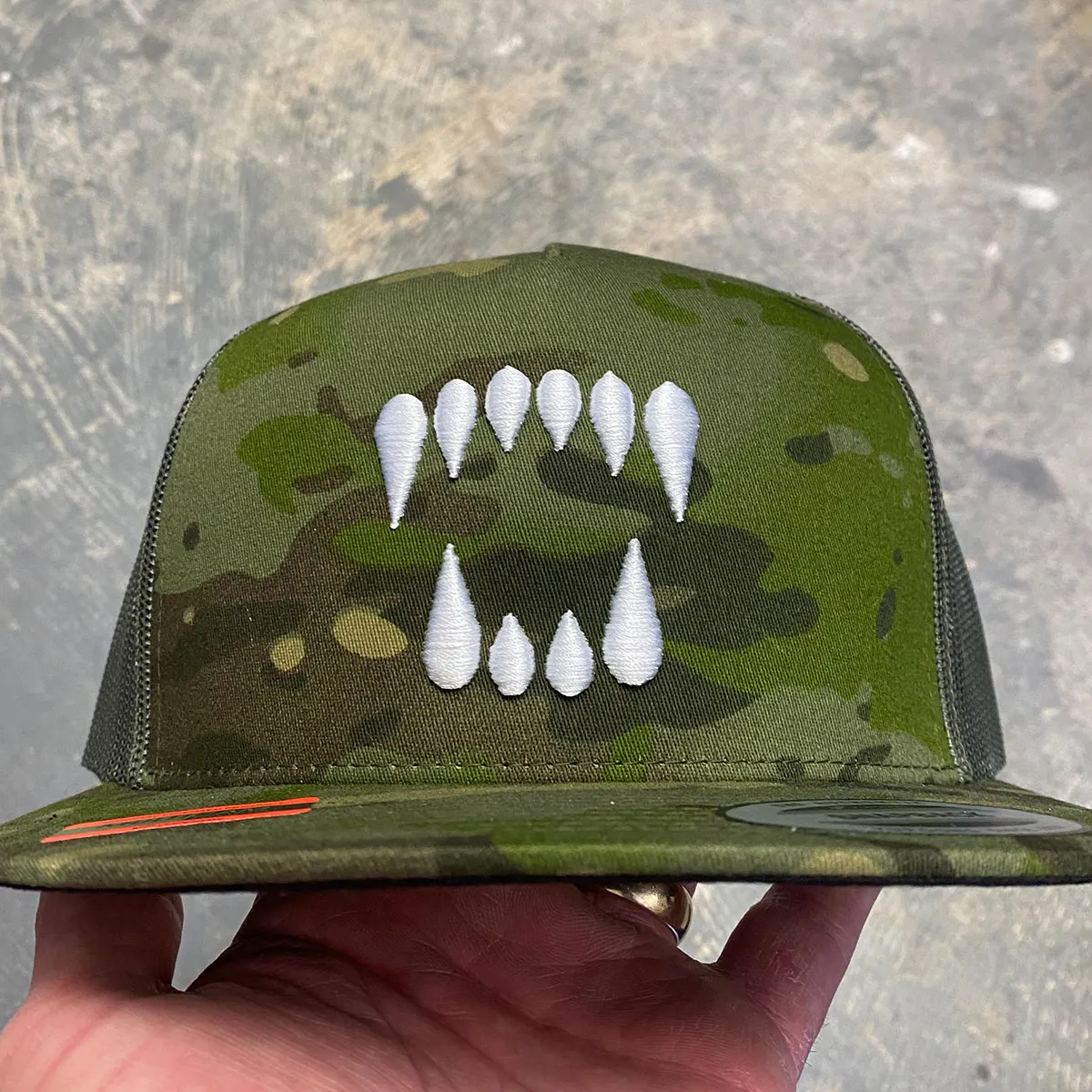 Camo flat bill trucker hat with 3D embroidered logo