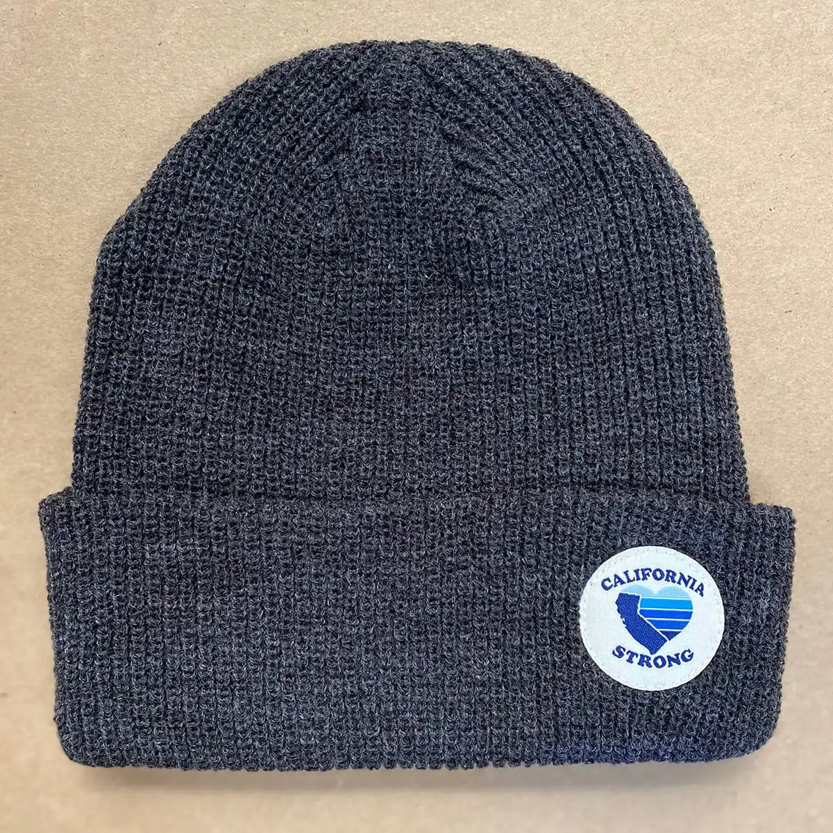 CA Strong custom cuffed beanie with label