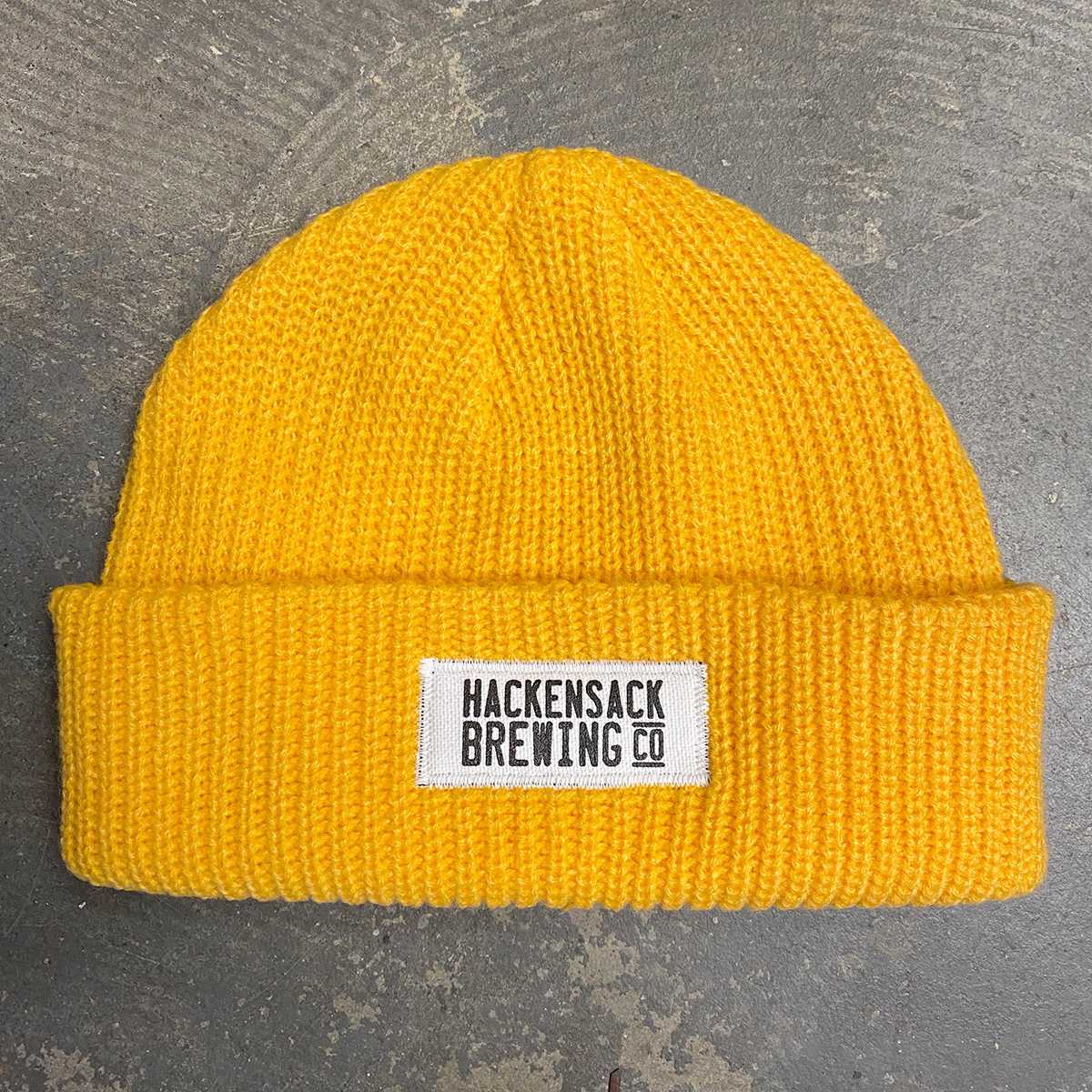 Custom beanie with screen printed canvas patch and zig-zag stitch