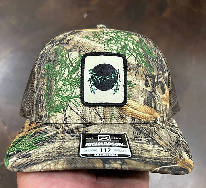 Custom camo hat with embroidered logo patch