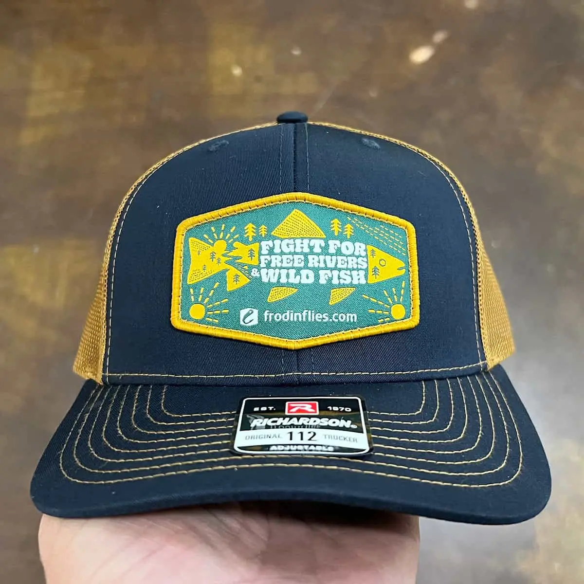 navy custom trucker hat with woven patch logo