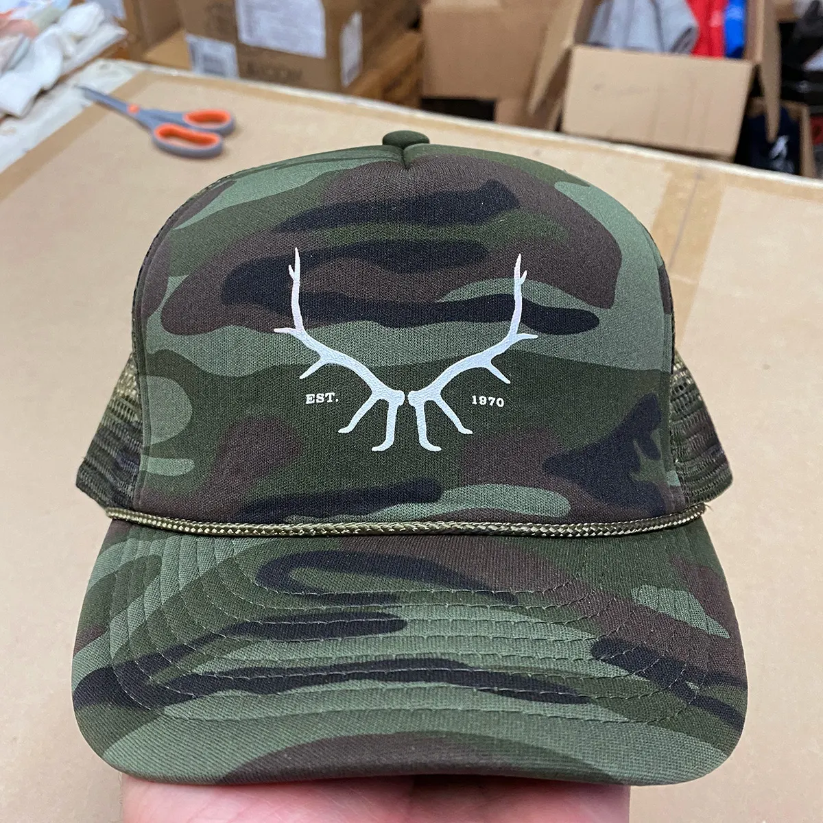 Full camo foam trucker hat with printed logo