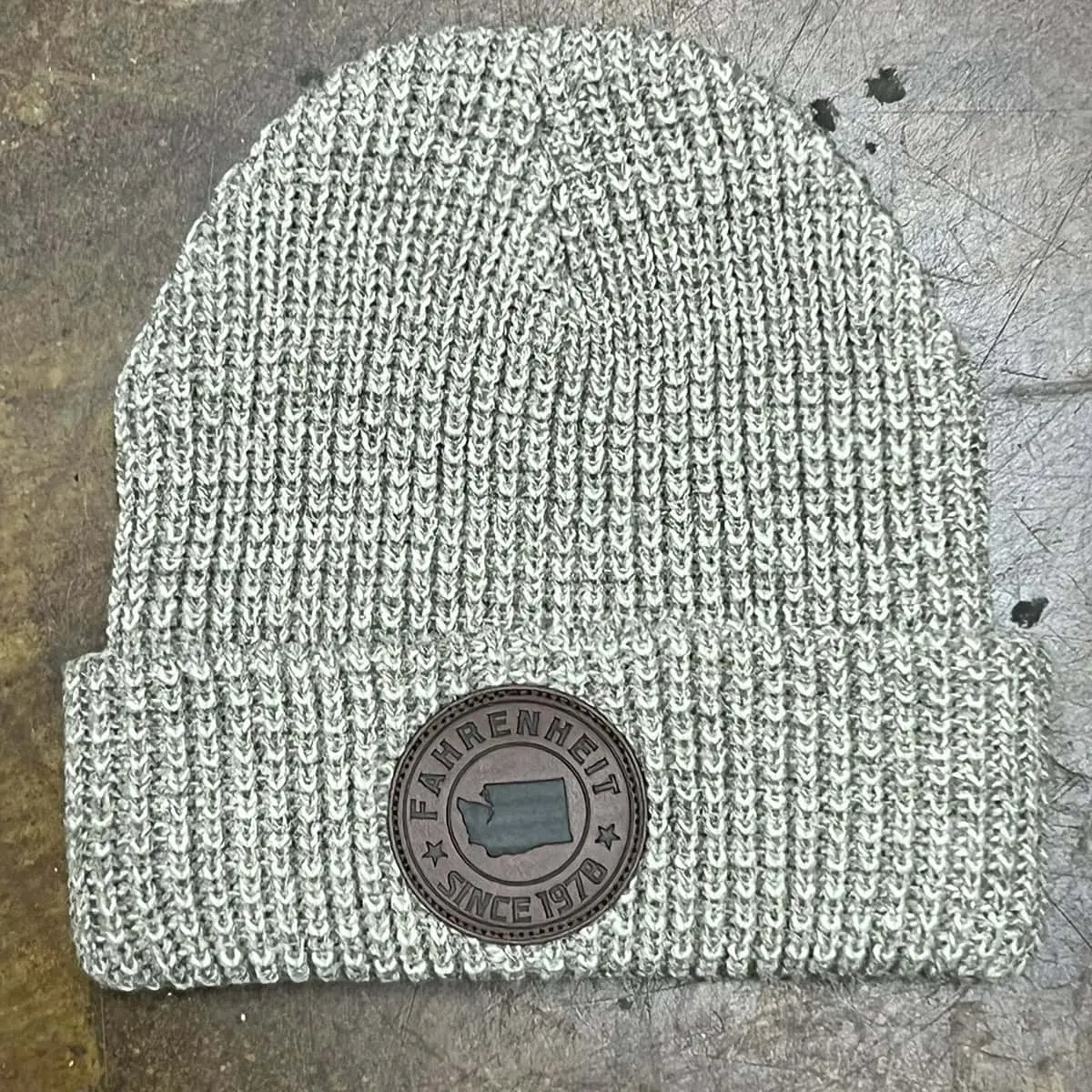 Knit beanie with custom leather patch on the cuff