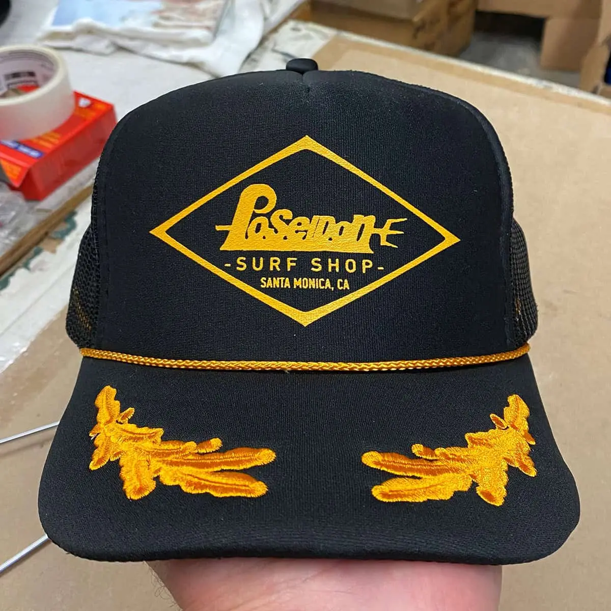 black custom printed otto foam trucker hat with captain logo