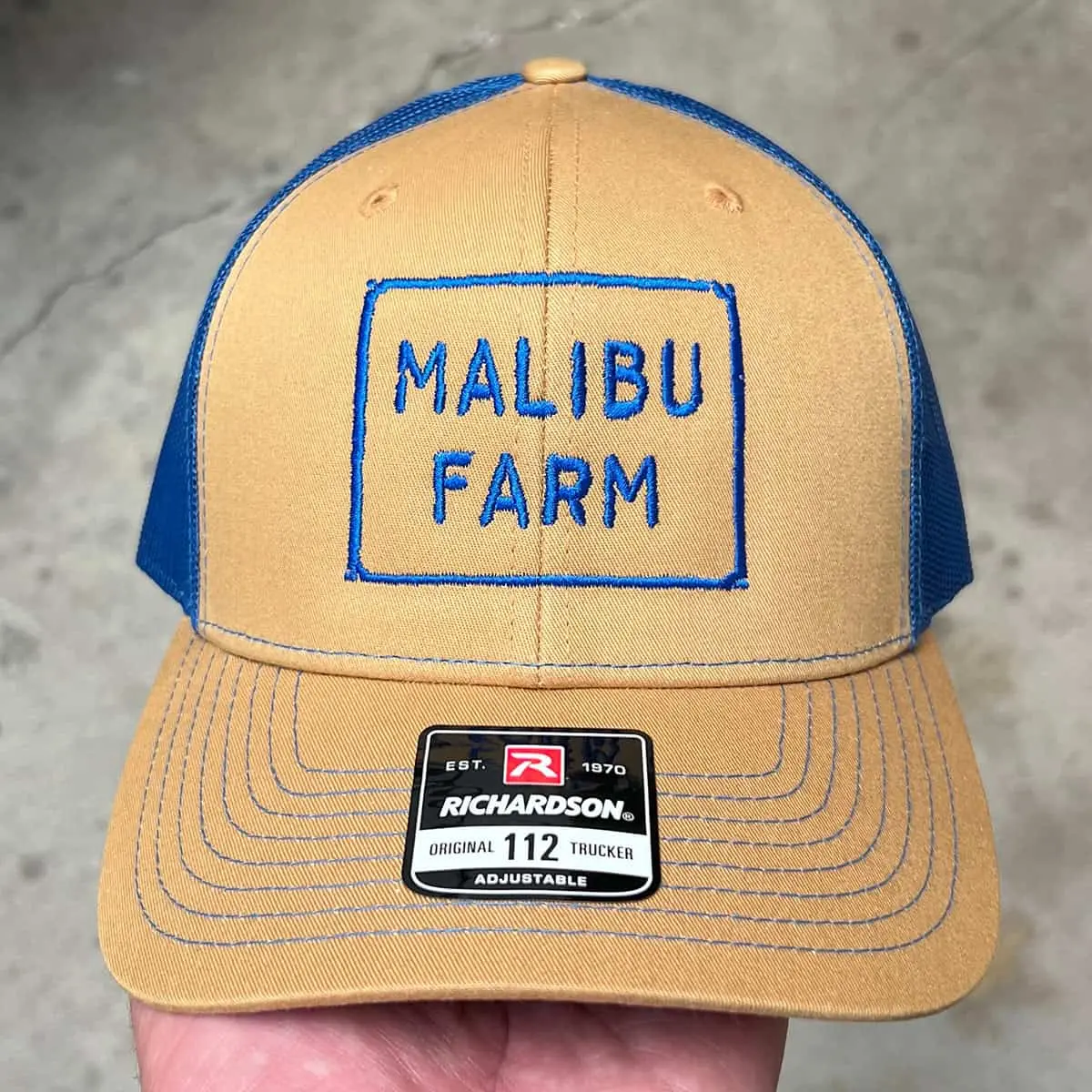 tan richardson 112 trucker hat with embroidered malibu farm logo