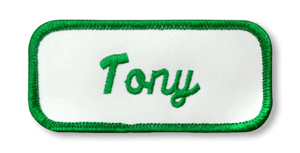 custom embroidered name patch with script lettering and heat seal backing