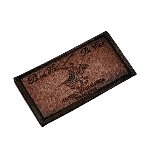 brown rectangular leather patch with debossed polo club logo