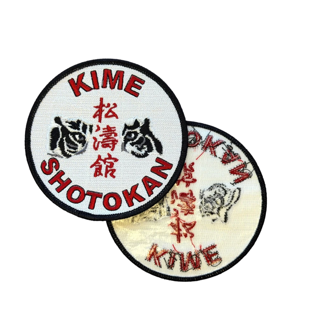 back of embroidered patch with heat seal backing