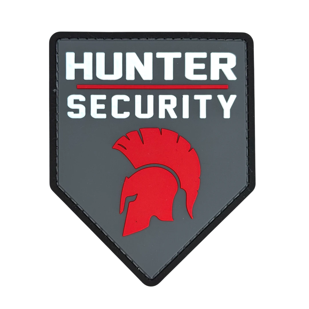 gray PVC shield patch with spartan helmet security logo