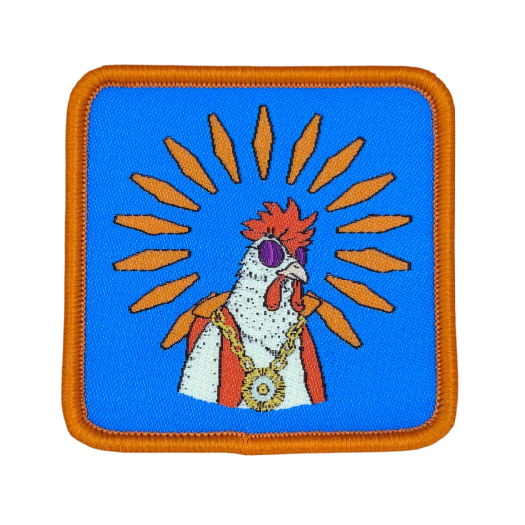 square woven patch with merrow border and chicken character logo