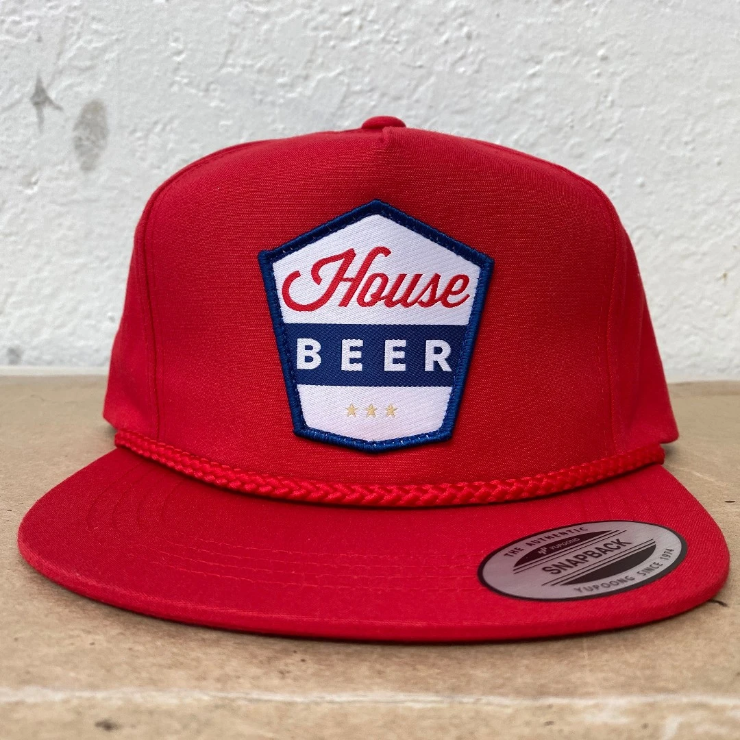 Red Yupoong 6002 rope hat with custom embroidery