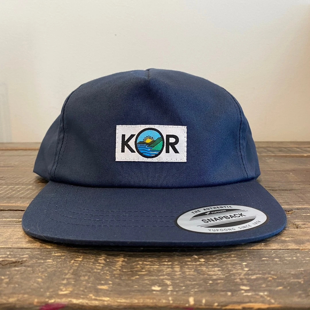 Navy Yupoong 6502 5-panel snapback with custom logo